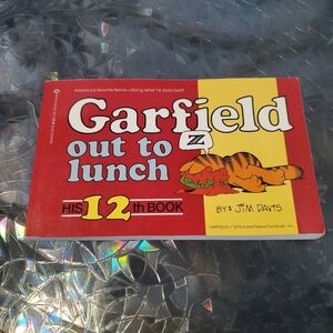 Garfield Out to Lunch (His 12th Book) Paperback – February 12, 1986 by Jim Davis